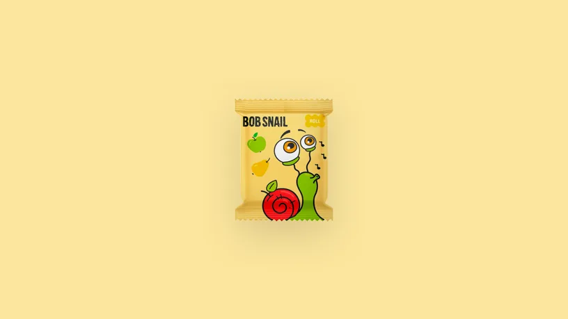 Bob Snail fruit snack pack with a cartoon snail, apple and pear on pale yellow